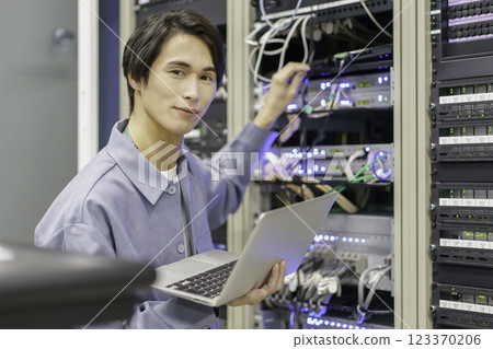 A young man working in front of the equipment in a TV station's control room. Filming courtesy of Sky Perfect TV Tokyo Media Center A young man working in front of the equipment in a TV station's control room. Filming courtesy of Sky Perfect TV Tokyo Media Center 123370206