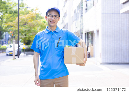 Logistics: Driver transporting luggage Logistics: Driver transporting luggage 123371472