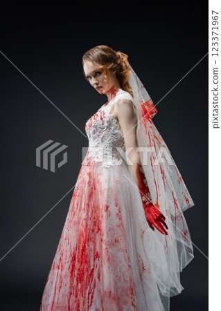 Bride in bloodied lingerie with katana evokes dark fantasy and horror elements Bride in bloodied lingerie with katana evokes dark fantasy and horror elements 123371967
