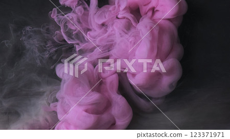 Fantastic paint texture. Fume smoke effect. Defocused pink color fluid flow liquid cloud vapor mist water ink on dark art background. Fantastic paint texture. Fume smoke effect. Defocused pink color fluid flow liquid cloud vapor mist water ink on dark art background. 123371971