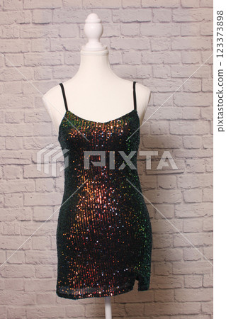 Sequined Mini Dress on Dress Form Thrift Store Display Sequined Mini Dress on Dress Form Thrift Store Display 123373898