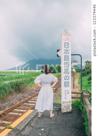 Oyama Station, the southernmost station in Japan, and a woman Oyama Station, the southernmost station in Japan, and a woman 123374440