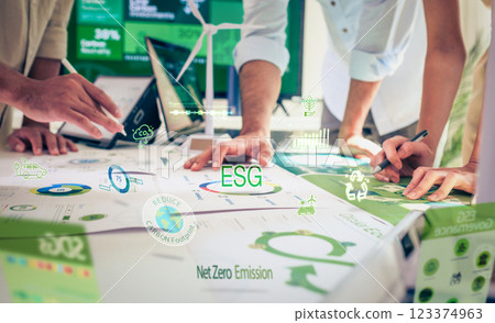 close up diversity team brainstorming focused on ESG (environment,social,governance)  for sdgs goals in a sustainable green office 123374963