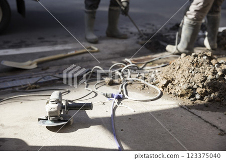 Disc grinder at the work site 123375040