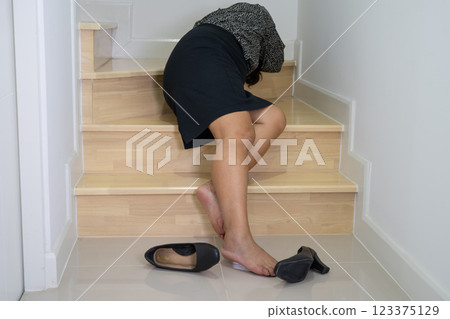 Asian lady fall down the stairs and pain at hip and waist because slippery surfaces. 123375129