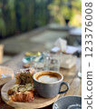 10 November 2024, Indonesia. A cup of coffee cappuccino or latte on the table 123376008