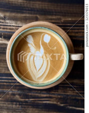A cup of coffee cappuccino or latte on the table A cup of coffee cappuccino or latte on the table 123376013