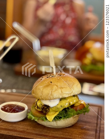 Classic hamburger with cutlet and french fries Classic hamburger with cutlet and french fries 123376021