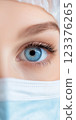 Close Up of Blue Eye and Protective Mask Highlighting Hygiene and Safety ai generative ai generative 123376265