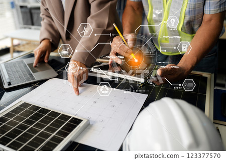 Engineer Teamwork Meeting, with partner on model building at company office. Engineer Teamwork Meeting, with partner on model building at company office. 123377570