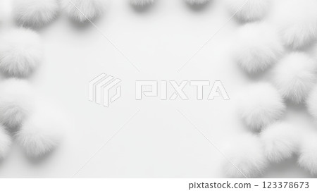 Soft white pom poms create an enchanting border on blank canvas Soft white pom poms create an enchanting border on blank canvas 123378673