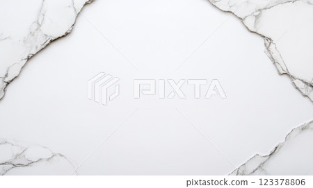 Smooth white marble surface adorned with delicate veining patterns 123378806