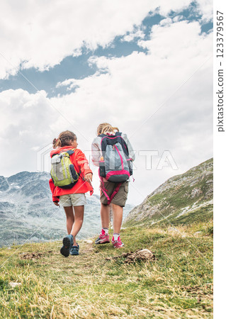 Two girls during mountain walking 123379567