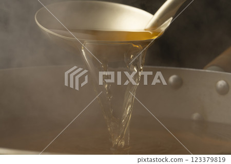 Pour in the broth Pour in the broth 123379819