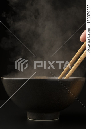 Steam rising from a teacup Steam rising from a teacup 123379925