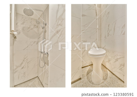 A stylish modern bathroom showcases a sleek shower with marble tiles and a minimalist toilet. The clean lines and elegant design emphasize contemporary aesthetics. 123380591