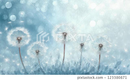 A frame of dandelion caps and fluff flying in the air on a pale blue sparkling background 123380871