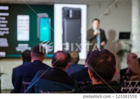 Audience attending technology presentation with focus on digital innovation discussion 123381559