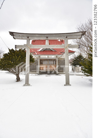 Photographing the grounds of Shinmura Inari Shrine in Kaminokuni, Hokkaido in winter Photographing the grounds of Shinmura Inari Shrine in Kaminokuni, Hokkaido in winter 123382766
