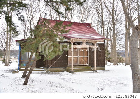 Photographing the grounds of Otomeyama Shrine in Kaminokuni, Hokkaido in winter 123383048
