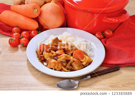 Classic curry rice made with chicken, potatoes, carrots, shimeji mushrooms and onions. Classic curry rice made with chicken, potatoes, carrots, shimeji mushrooms and onions. 123383889