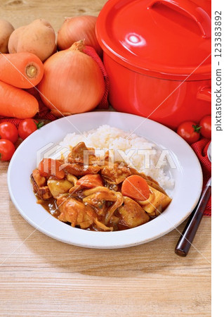 Classic curry rice made with chicken, potatoes, carrots, shimeji mushrooms and onions. Classic curry rice made with chicken, potatoes, carrots, shimeji mushrooms and onions. 123383892