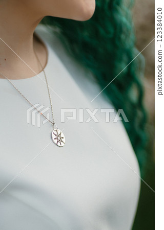 young girl bride with green hair in a national dress 123384010