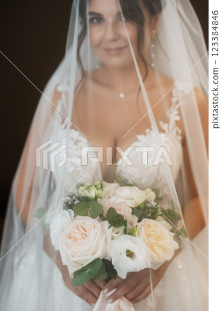 bride in a white dress at the training camp 123384846