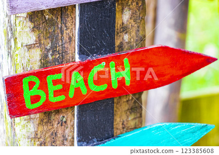 Sand beach surf relax colorful directional arrows Ilha Grande Brazil. 123385608