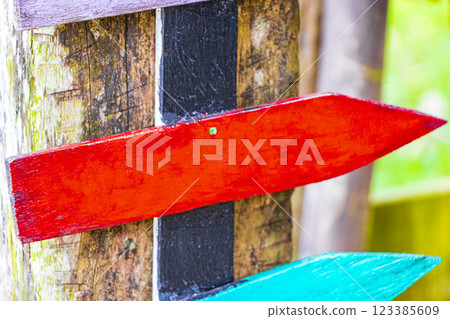 Colorful plain beach directional arrows on Ilha Grande Brazil. Colorful plain beach directional arrows on Ilha Grande Brazil. 123385609
