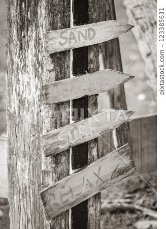 Sand beach surf relax colorful directional arrows Ilha Grande Brazil. 123385631