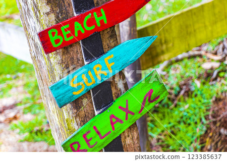 Sand beach surf relax colorful directional arrows Ilha Grande Brazil. 123385637
