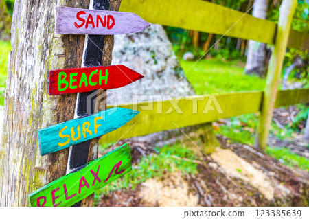 Sand beach surf relax colorful directional arrows Ilha Grande Brazil. Sand beach surf relax colorful directional arrows Ilha Grande Brazil. 123385639