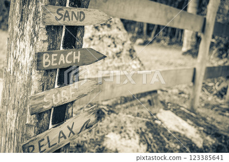 Sand beach surf relax colorful directional arrows Ilha Grande Brazil. 123385641