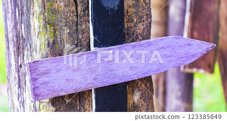Colorful violet plain beach directional arrows on Ilha Grande Brazil. 123385649