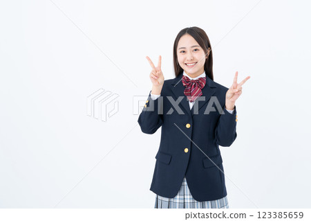 High school girl making a peace sign 123385659