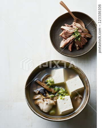 Japanese tofu soup with mushrooms and scallions Japanese tofu soup with mushrooms and scallions 123386306