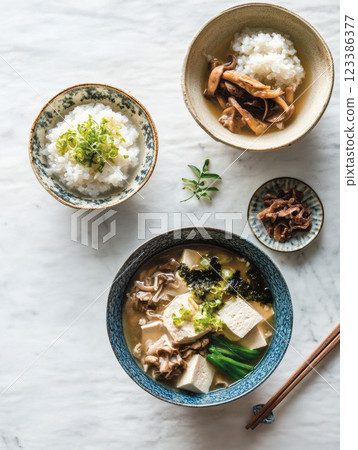 Japanese miso soup with tofu and rice bowls Japanese miso soup with tofu and rice bowls 123386377