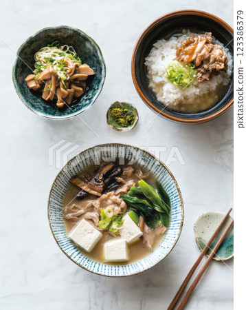 Japanese miso soup with tofu and side dishes Japanese miso soup with tofu and side dishes 123386379