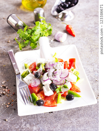 Salad with cheese and fresh vegetables . Greek salad. Salad with cheese and fresh vegetables . Greek salad. 123386671