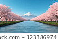 Stunning view of mount fuji surrounded by cherry blossoms in a serene japanese river 123386974
