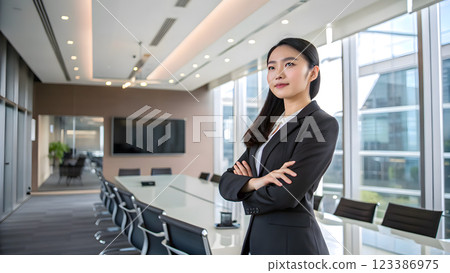 Young beautiful asian business woman smiling in morden office 123386975