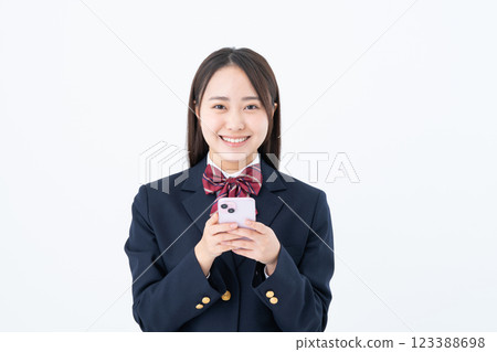 High school girl using smartphone 123388698