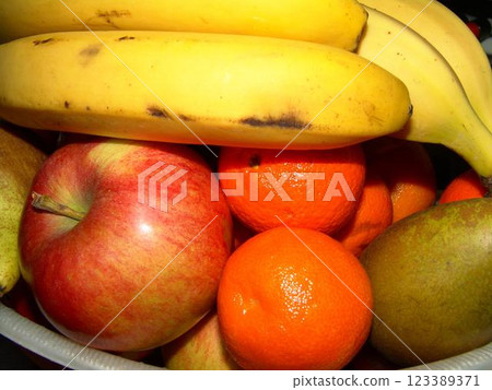 Fruit on a plate close view, apples, bananas Fruit on a plate close view, apples, bananas 123389371