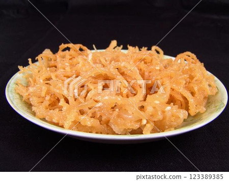 Seafood dishes on white plates 123389385