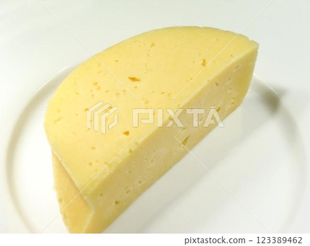 Sheep Milk Cheese and Baked Goods on Tableware with Fruit 123389462