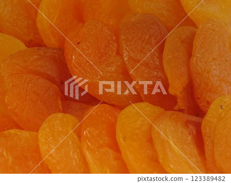 Dried apricots close view background Dried apricots close view background 123389482
