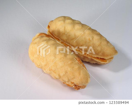 Sweet waffle cake close view background Sweet waffle cake close view background 123389494