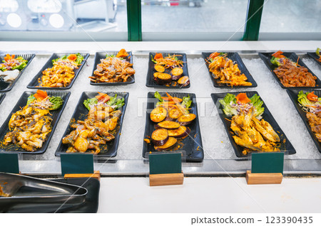 Asian seafood, meat and vegetable dishes at buffet at the Vietnamese restaurant in Asia in Vietnam 123390435