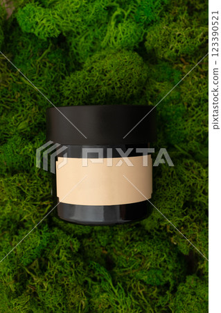 Body scrub, hair conditioner, facial mask beauty product mockup on green moss background Body scrub, hair conditioner, facial mask beauty product mockup on green moss background 123390521